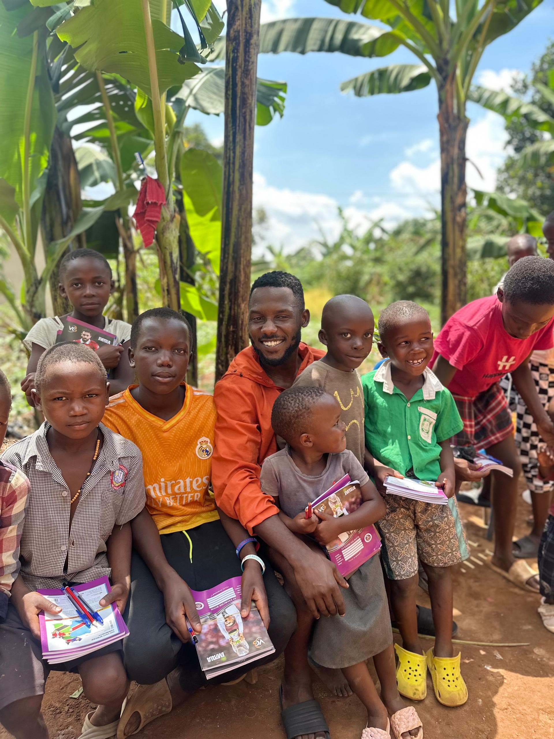 A mother and children smiling together